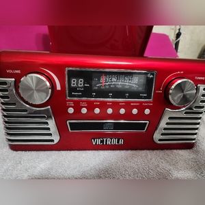 Victrola 50's retro record player, a CD player, Bluetooth, and AM/FM radio.